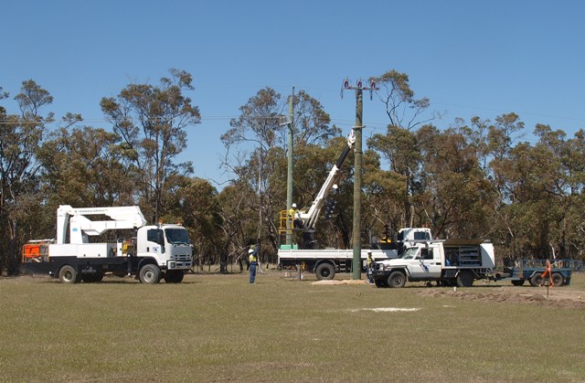 Putting up the pole for connecting to the 22kV feeder.